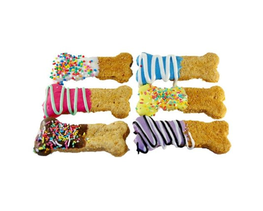 Colorful bone-shaped dog treats with various toppings. Australian Made Natural and Hand Decorated Dog Treats